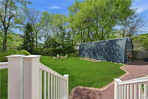 a view of a backyard with a garden