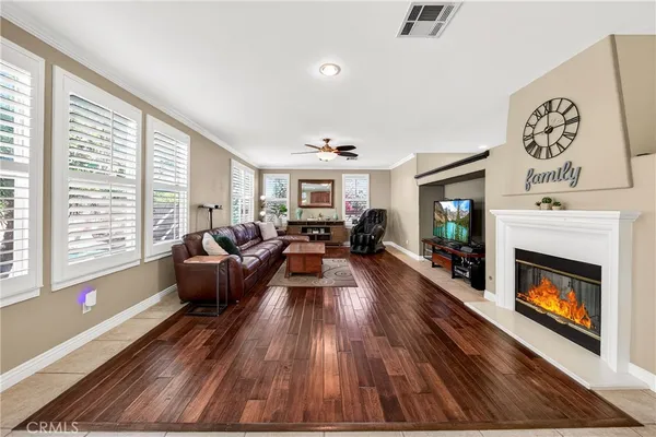 a view of a livingroom with furniture and windows
