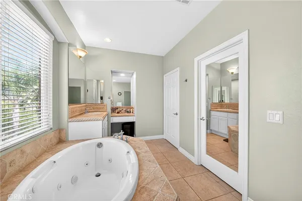 a backyard of a house with outdoor seating