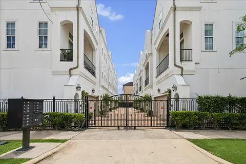 a bathroom with a sink a mirror and a window