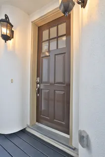 a bath tub sitting next to a window