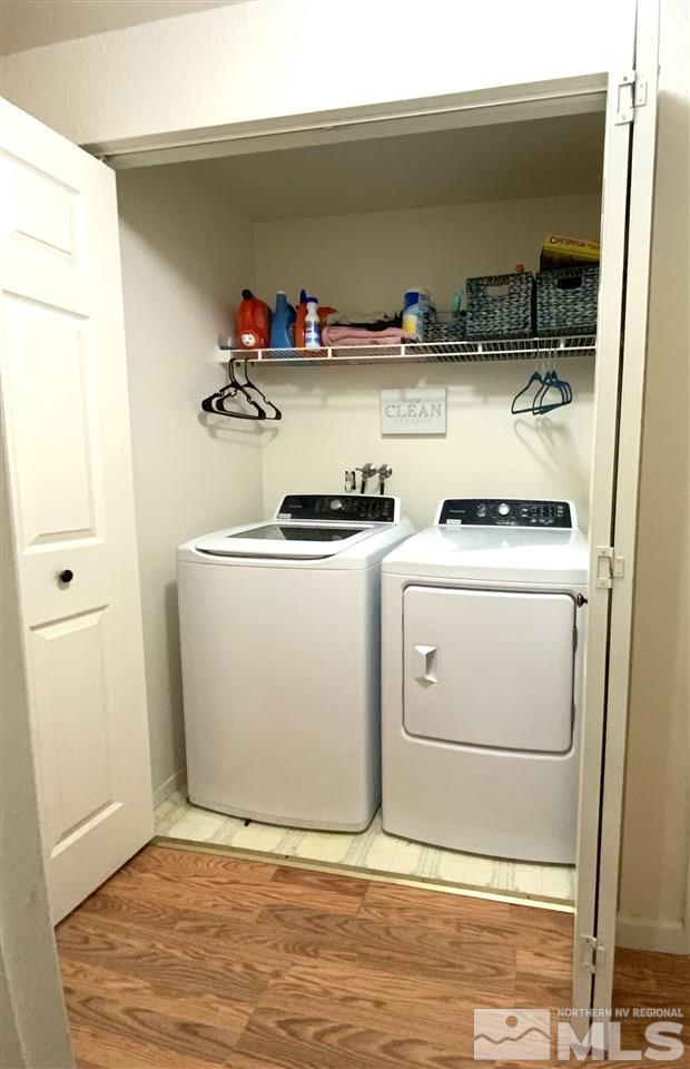 282 River Boat Road Dayton, NV 89403 - Photo 12 of 15 a utility room with dryer and washer