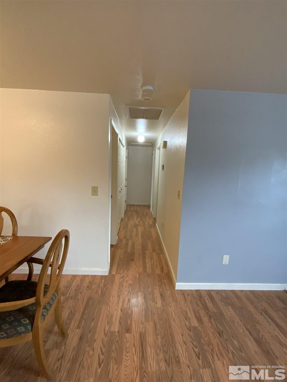 282 River Boat Road Dayton, NV 89403 - Photo 5 of 15 a view of a livingroom with furniture and wooden floor