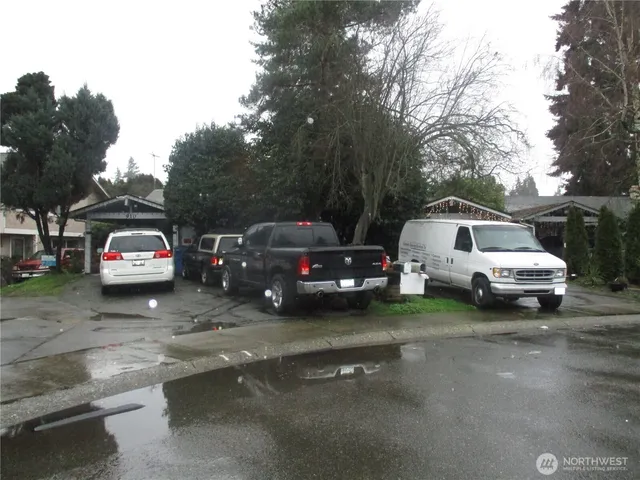 a view of a cars parked in a parking lot
