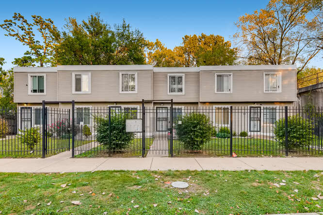 5815 South May Street Chicago, IL 60621 - Photo 2 of 26 front view of a house with a yard