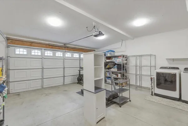 a view of a room with washing machine