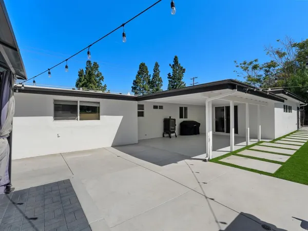 a front view of a house with a porch