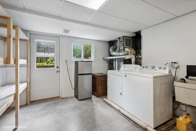 a view of a balcony and yard