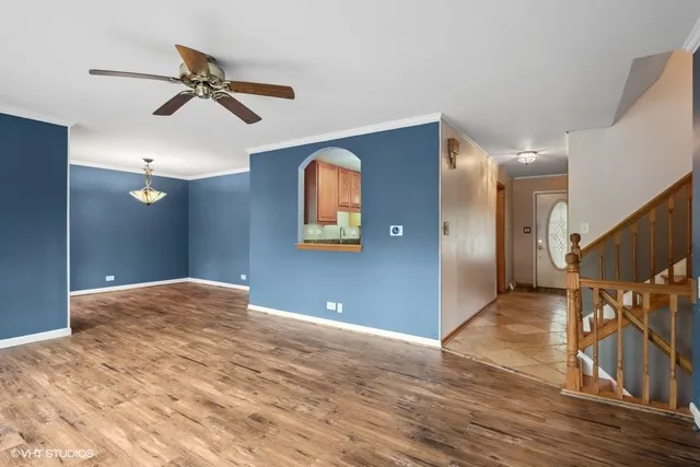 a view of a livingroom with a staircase