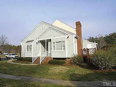 8442 Wycombe Lane Raleigh, NC 27615 - Photo 1 of 1 a front view of a house with a yard