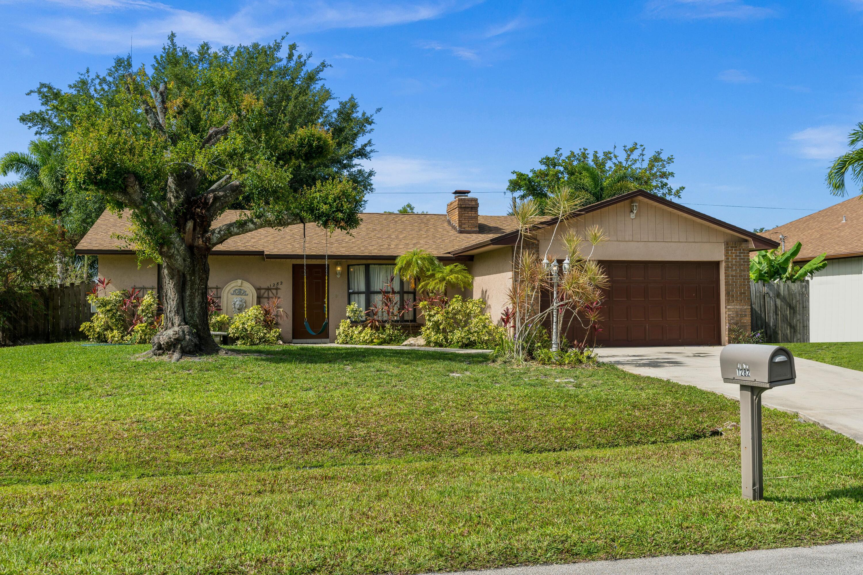 1282 Southwest Chase Road Port St. Lucie, FL 34953 - Photo 1 of 27 front