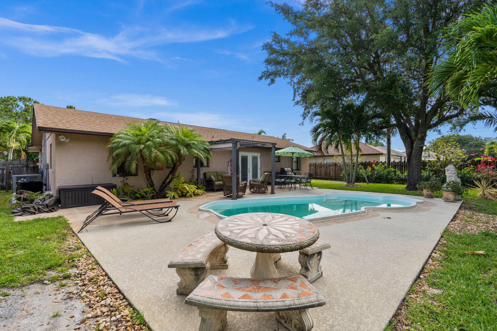 1282 Southwest Chase Road Port St. Lucie, FL 34953 - Photo 16 of 27 pool