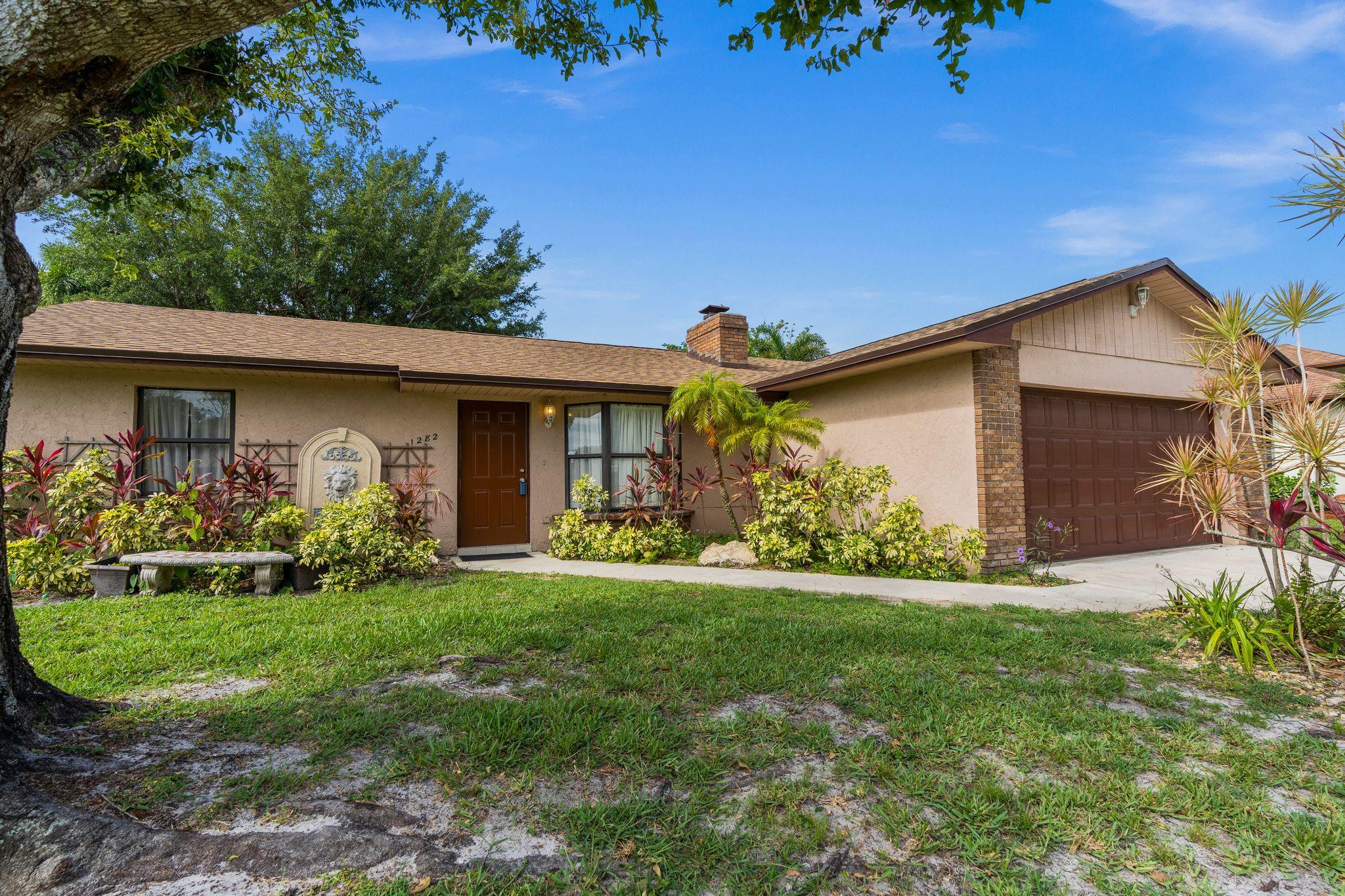 1282 Southwest Chase Road Port St. Lucie, FL 34953 - Photo 26 of 27 front