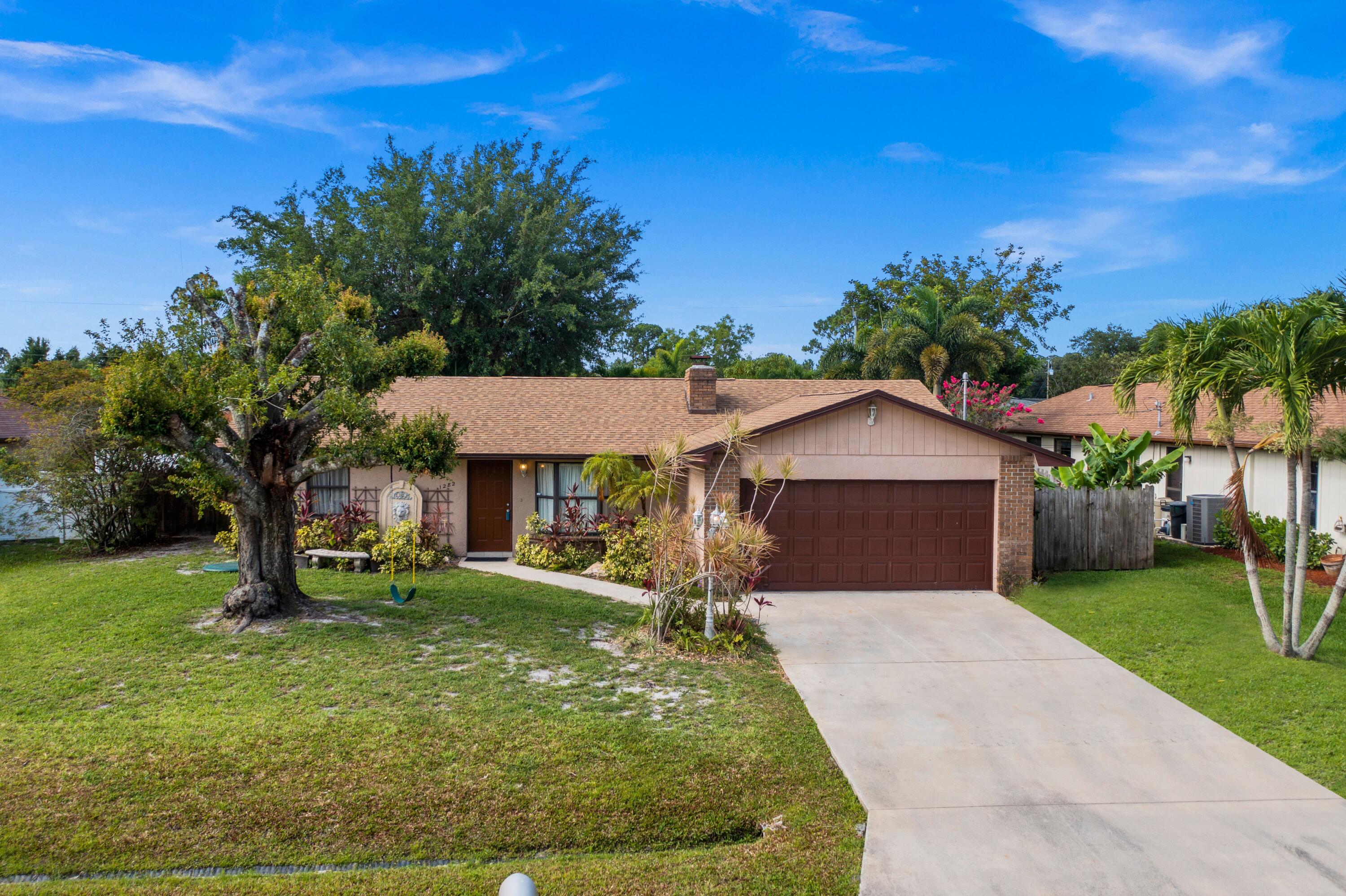1282 Southwest Chase Road Port St. Lucie, FL 34953 - Photo 27 of 27 front