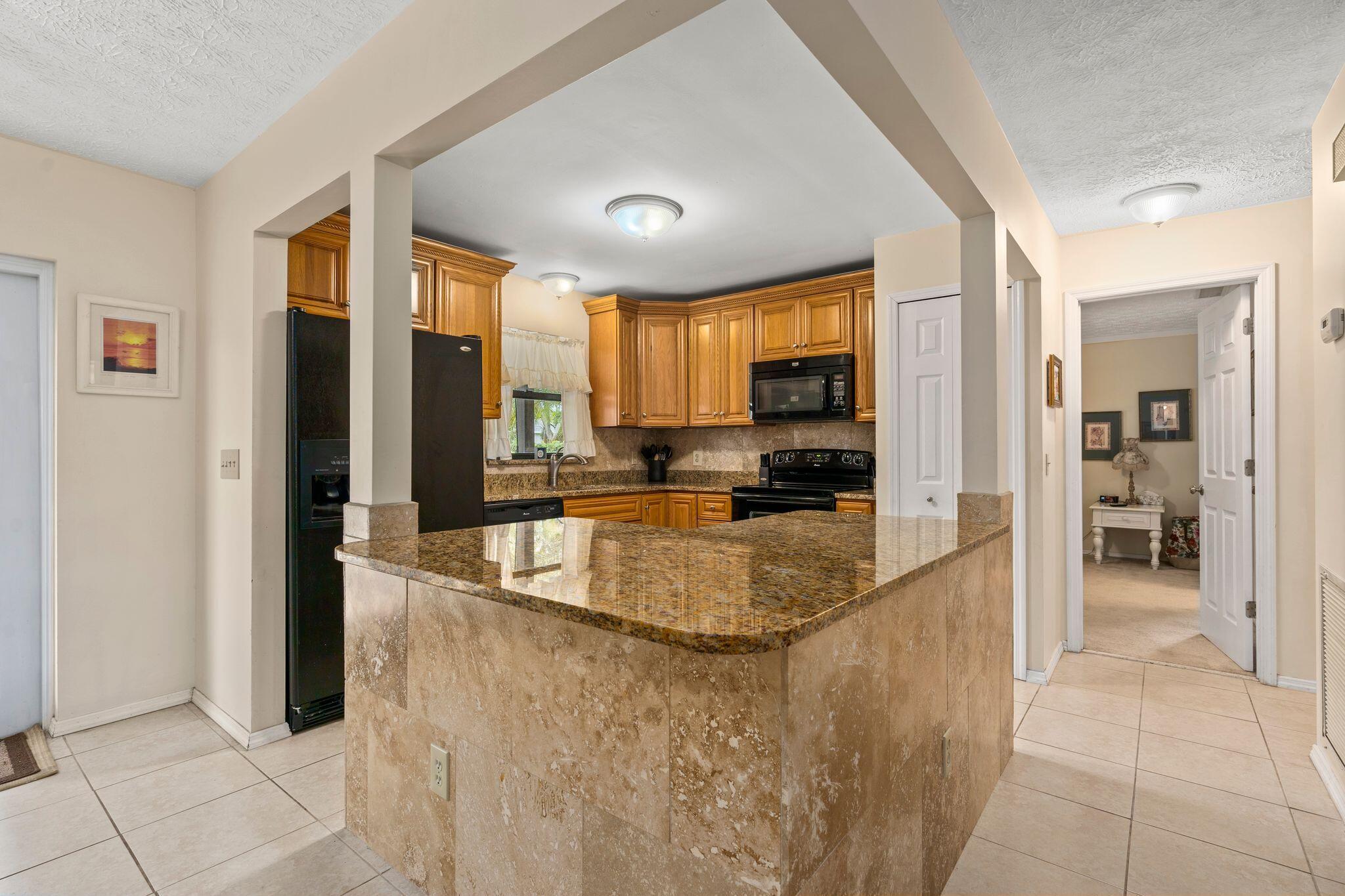 1282 Southwest Chase Road Port St. Lucie, FL 34953 - Photo 7 of 27 kitchen