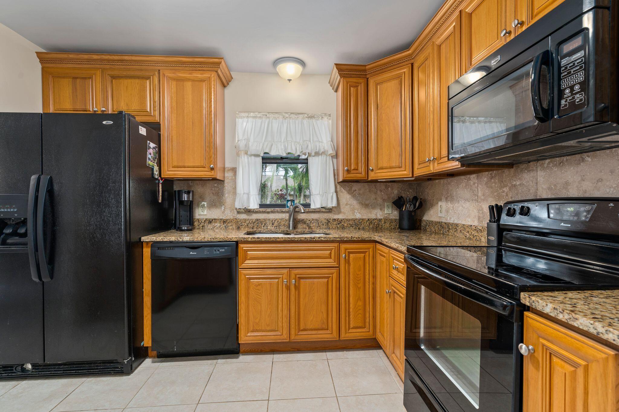 1282 Southwest Chase Road Port St. Lucie, FL 34953 - Photo 8 of 27 kitchen