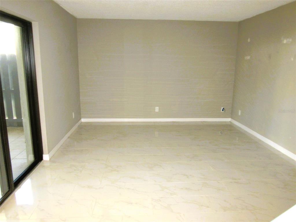 17455 Overhill Drive, Unit B Fort Myers, FL 33908 - Photo 7 of 13 a view of a bathtub in a room