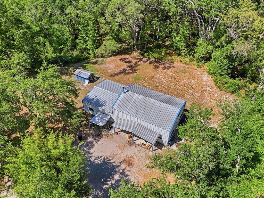 401 Southeast Falcon Road Branford, FL 32008 - Photo 9 of 76 an aerial view of a house with a yard
