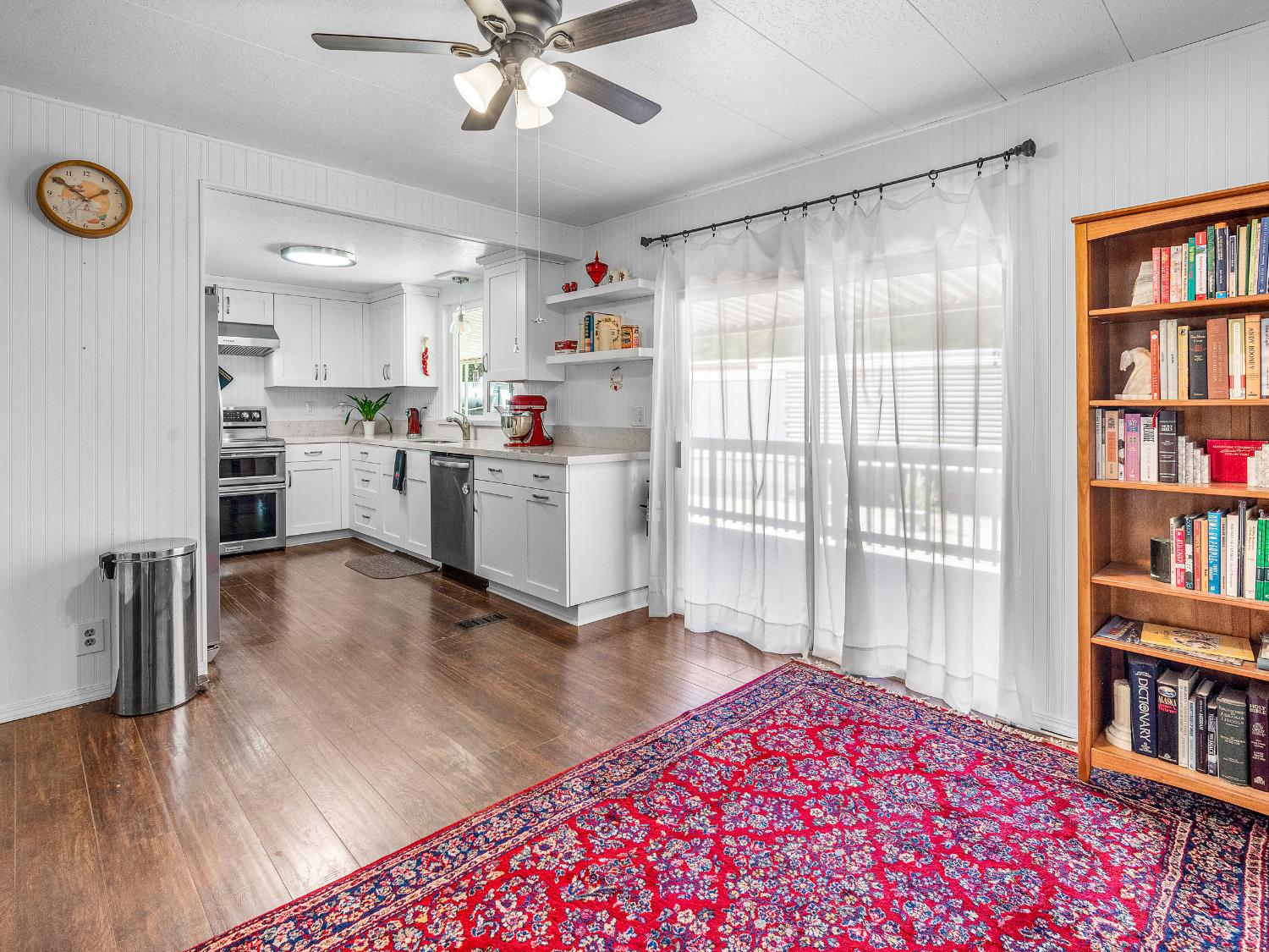 2850 Hidden Springs Circle Placerville, CA 95667 - Photo 12 of 40 a kitchen with a refrigerator and a wooden floor