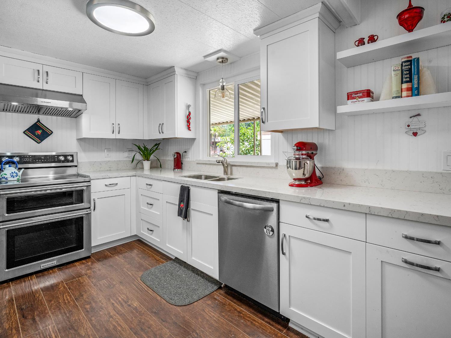 2850 Hidden Springs Circle Placerville, CA 95667 - Photo 14 of 40 a kitchen with a sink cabinets and wooden floor