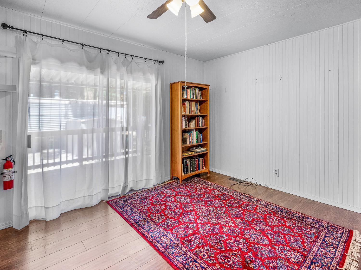 2850 Hidden Springs Circle Placerville, CA 95667 - Photo 17 of 40 a bedroom with a bed and a chandelier fan