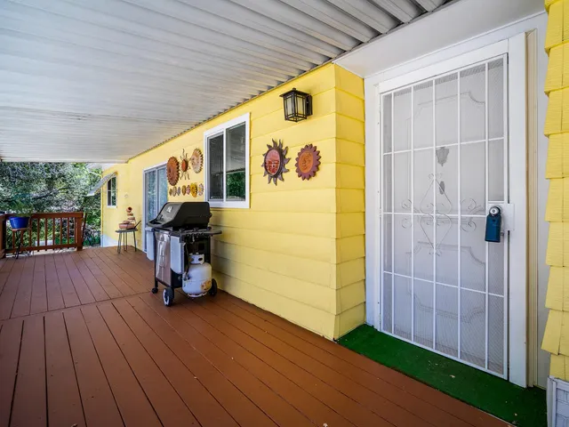 a view of front door and wooden floor