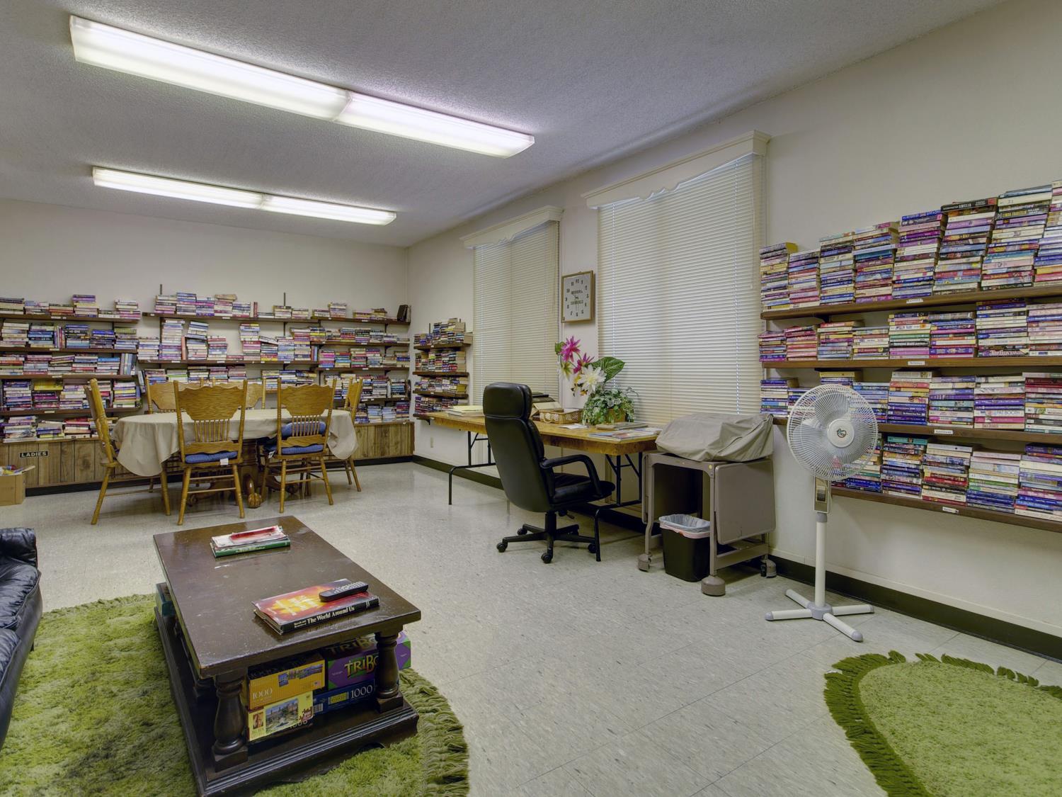 2850 Hidden Springs Circle Placerville, CA 95667 - Photo 37 of 40 a living room with lots of furniture and gym equipment