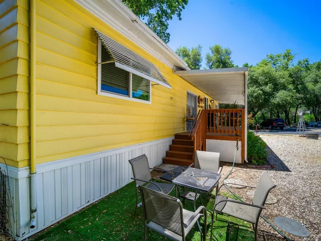 a view of outdoor sitting area with chairs