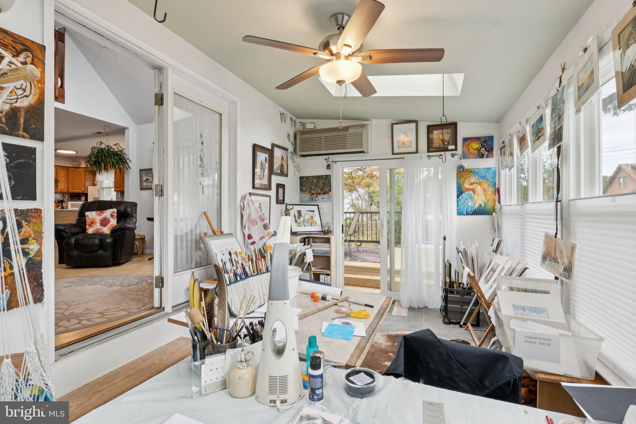 968 Chesapeake Avenue Deale, MD 20751 - Photo 17 of 57 a view of a livingroom with furniture and a bookshelf