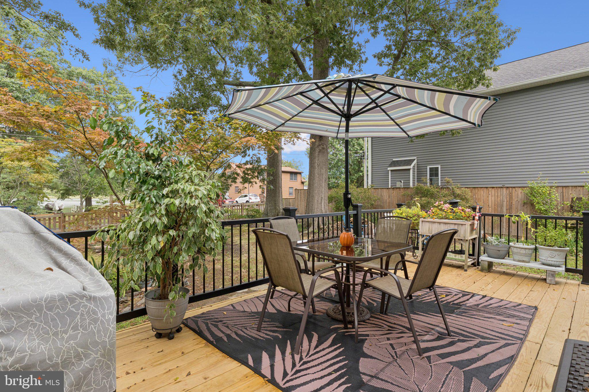 968 Chesapeake Avenue Deale, MD 20751 - Photo 30 of 57 a view of a patio with furniture and table
