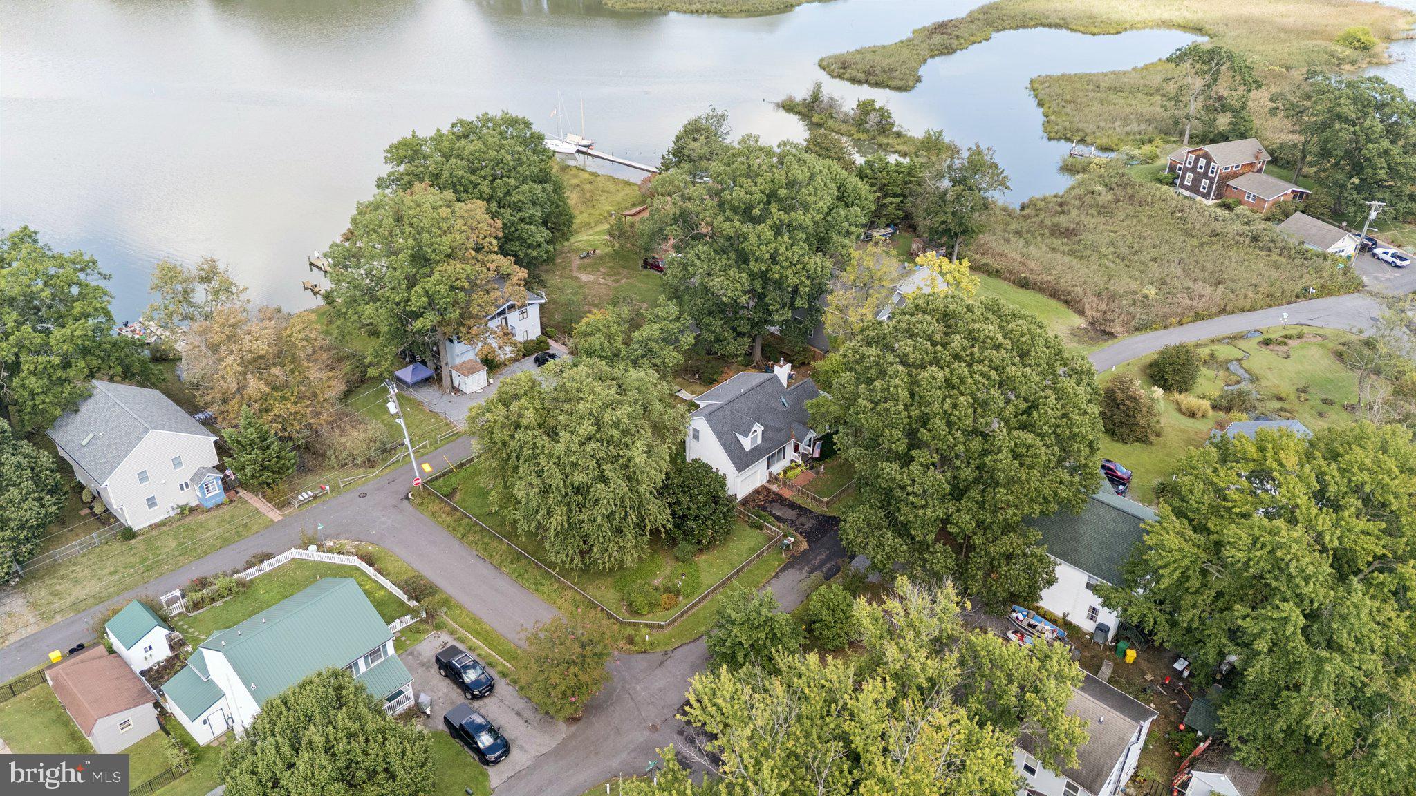 968 Chesapeake Avenue Deale, MD 20751 - Photo 3 of 57 an aerial view of a residential houses with outdoor space