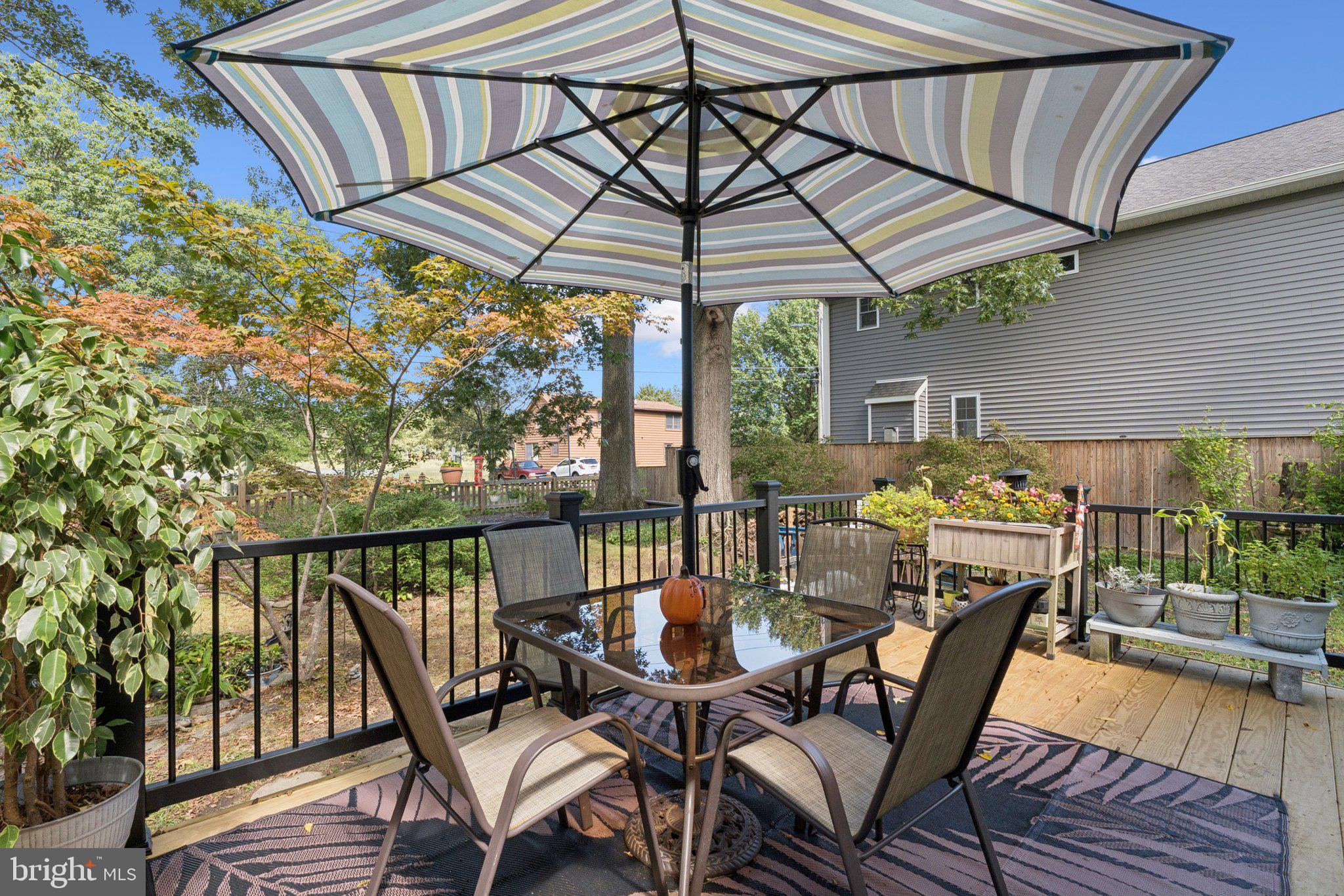 968 Chesapeake Avenue Deale, MD 20751 - Photo 31 of 57 a view of balcony with furniture and wooden deck