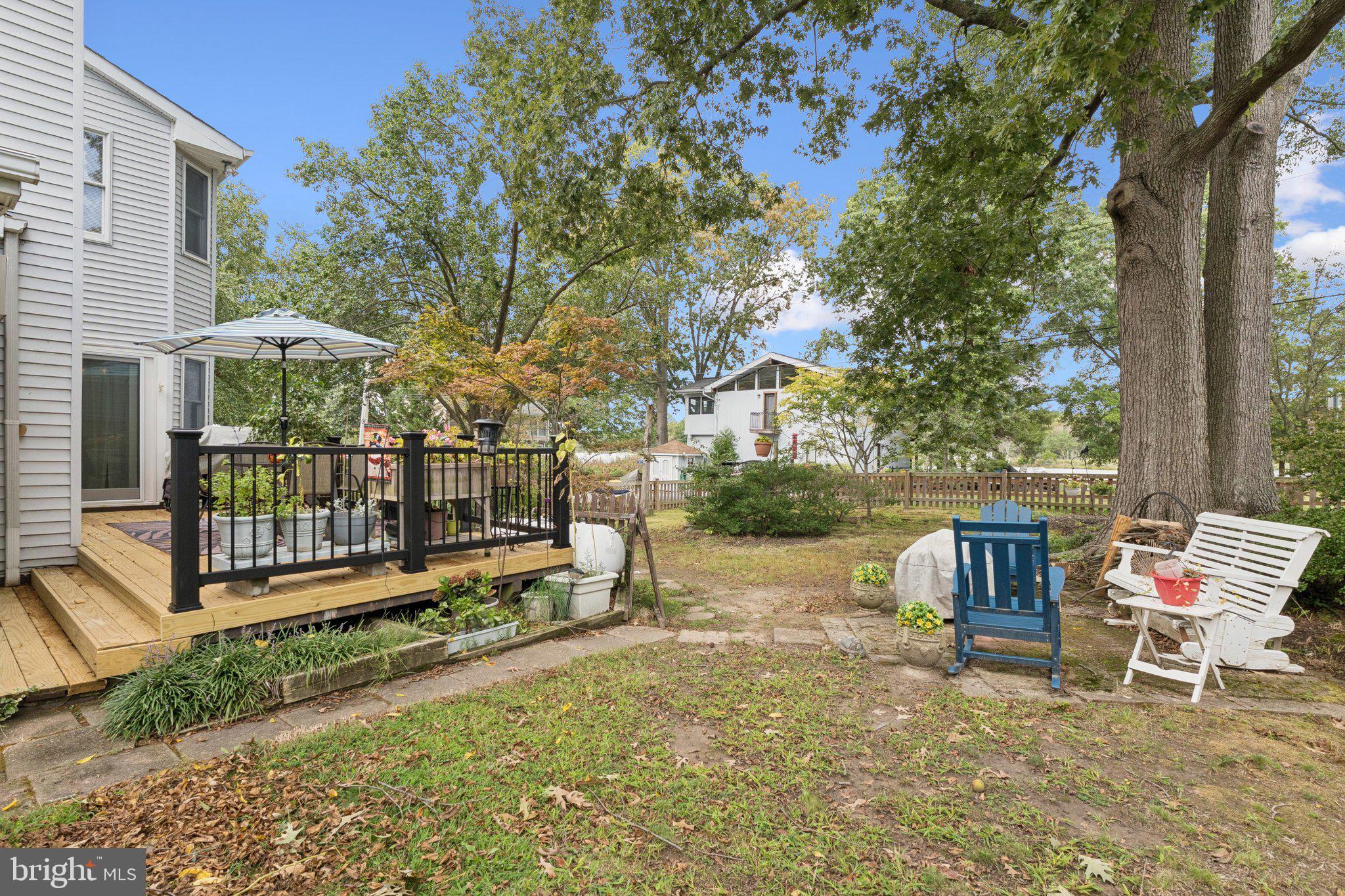 968 Chesapeake Avenue Deale, MD 20751 - Photo 33 of 57 a view of house with backyard and outdoor seating