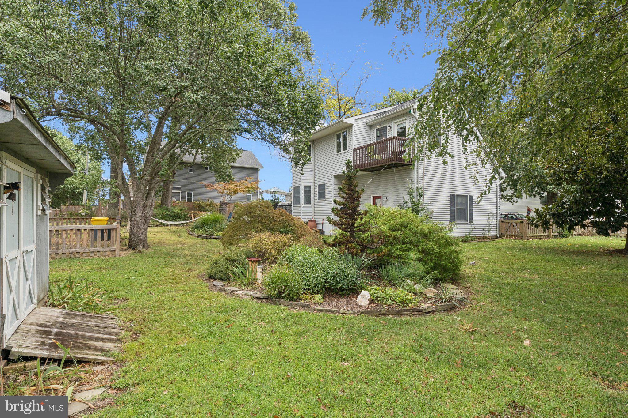 968 Chesapeake Avenue Deale, MD 20751 - Photo 34 of 57 a front view of a house with a yard