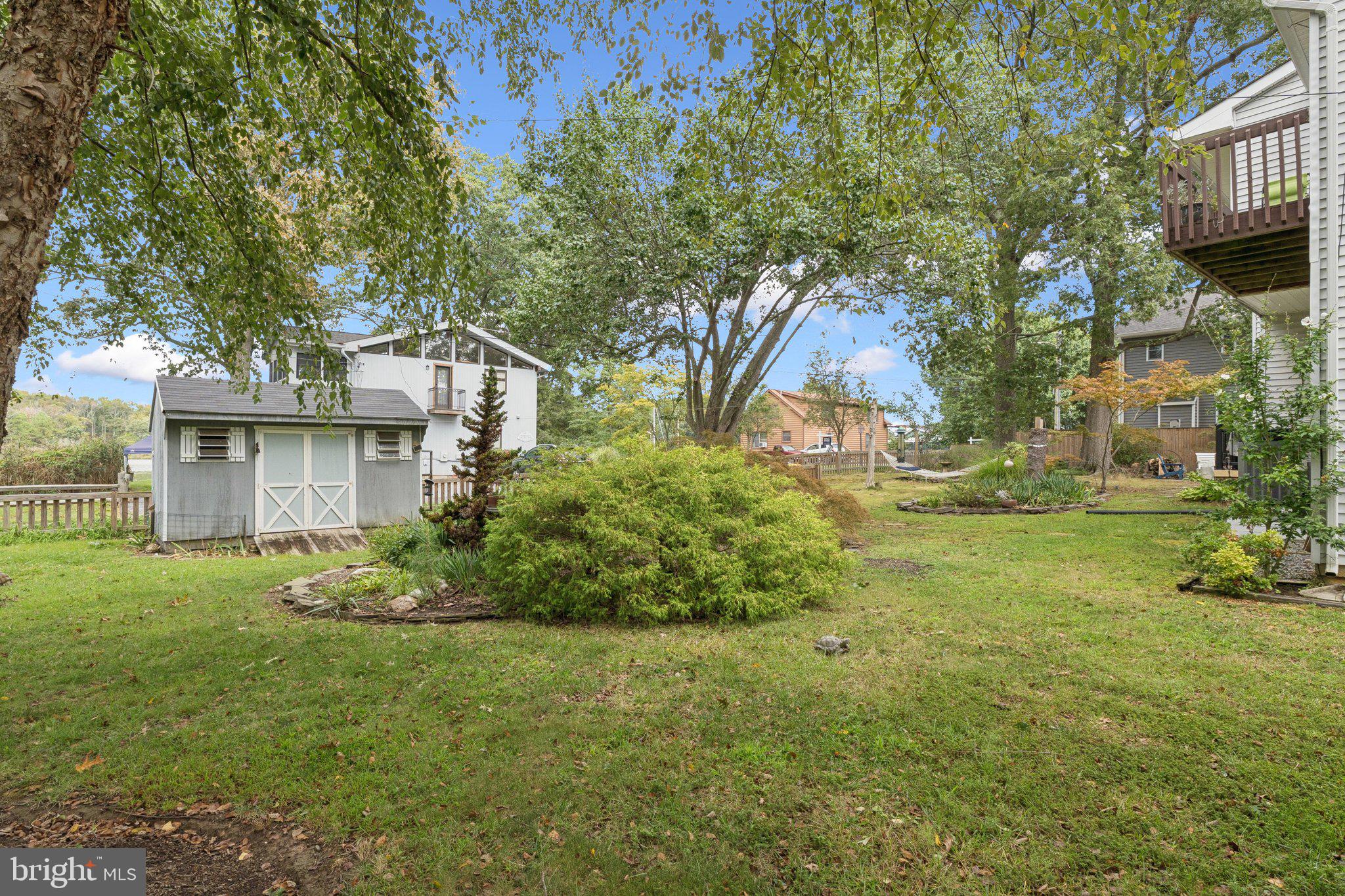 968 Chesapeake Avenue Deale, MD 20751 - Photo 37 of 57 a front view of a house with garden