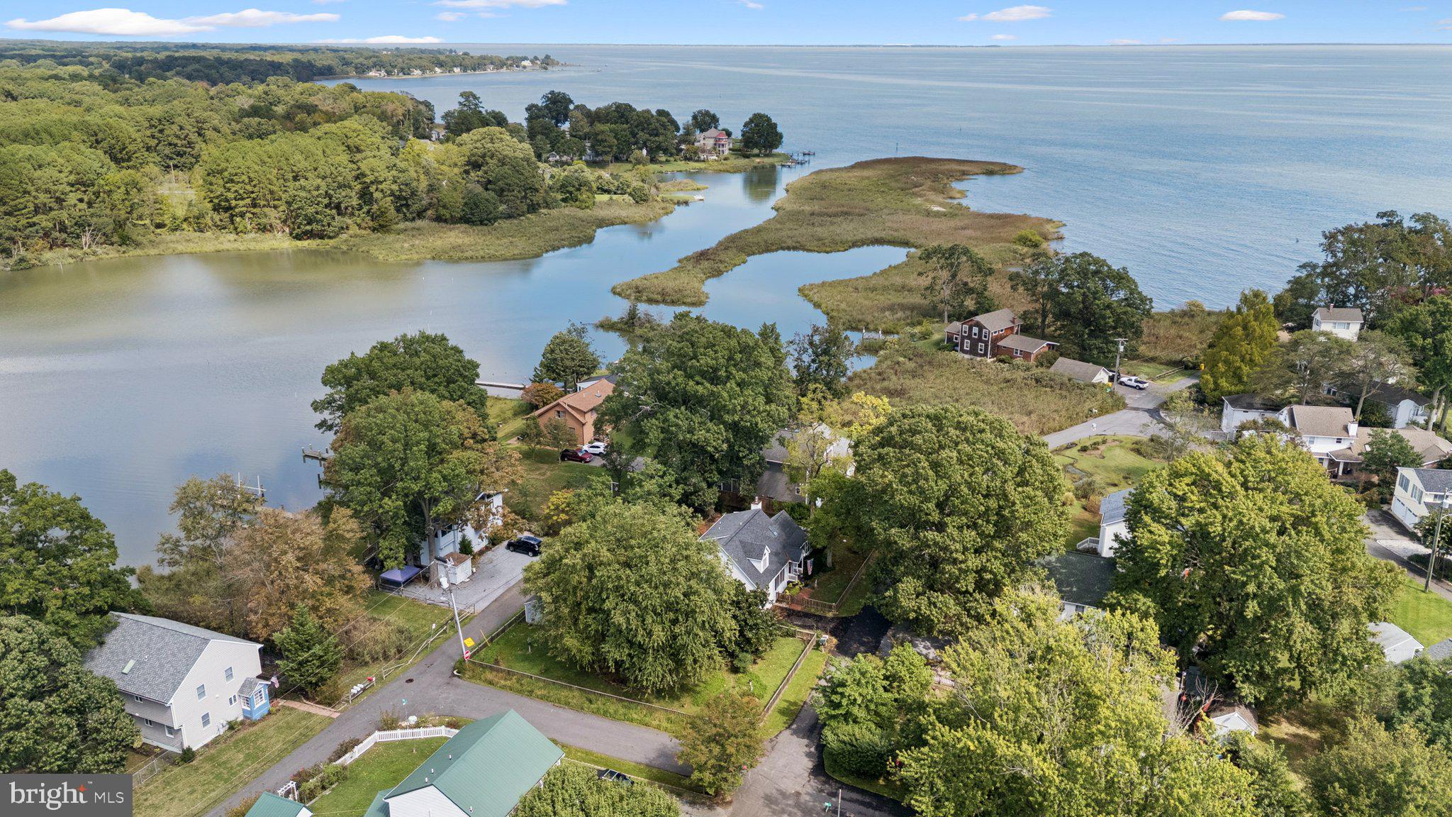 968 Chesapeake Avenue Deale, MD 20751 - Photo 41 of 57 an aerial view of a house with a yard and lake view