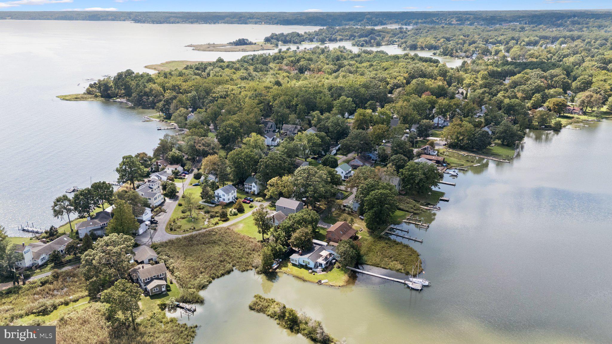 968 Chesapeake Avenue Deale, MD 20751 - Photo 46 of 57 an aerial view of a house with a yard and lake view