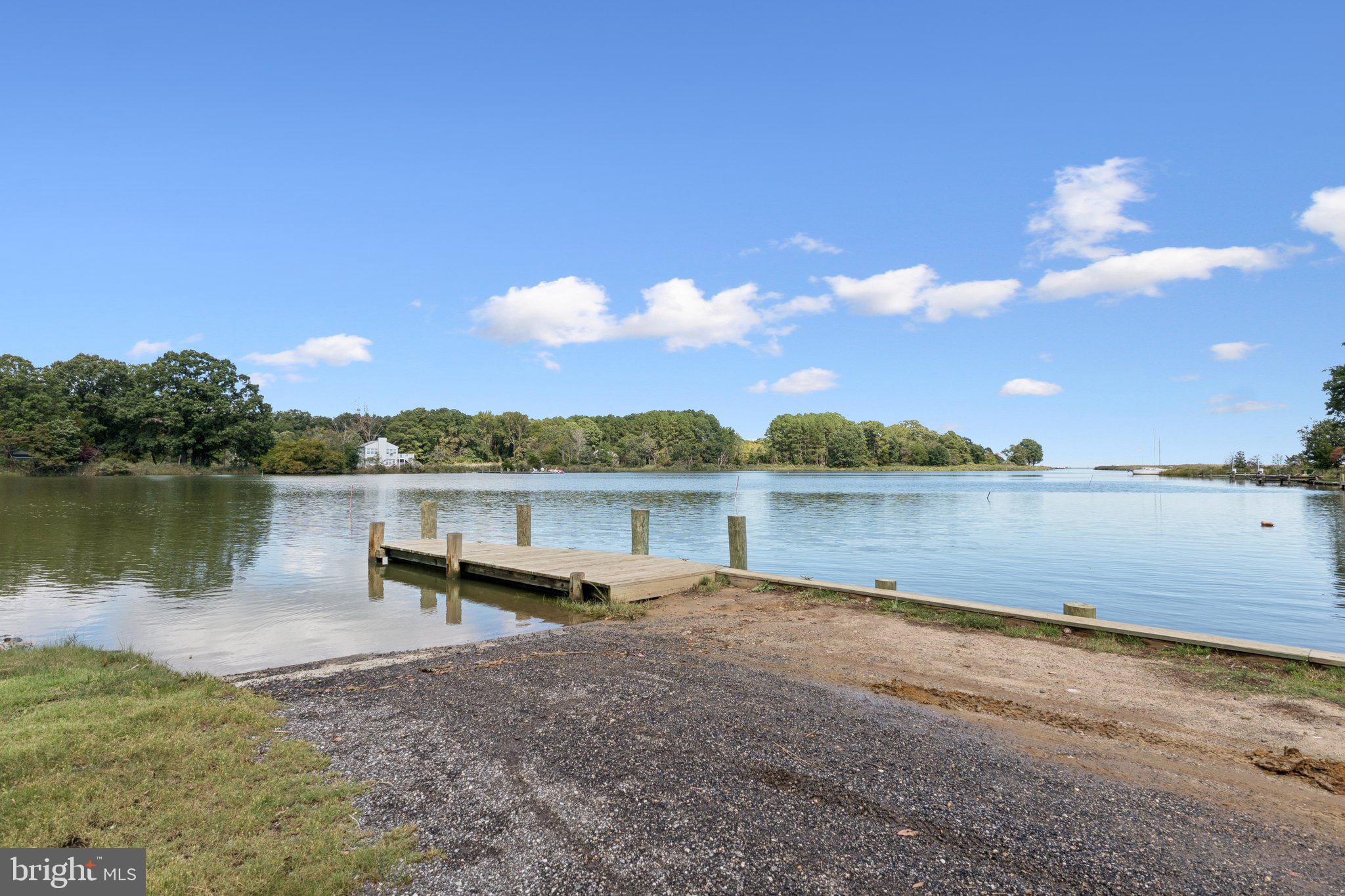 968 Chesapeake Avenue Deale, MD 20751 - Photo 49 of 57 a view of a lake with houses in the background