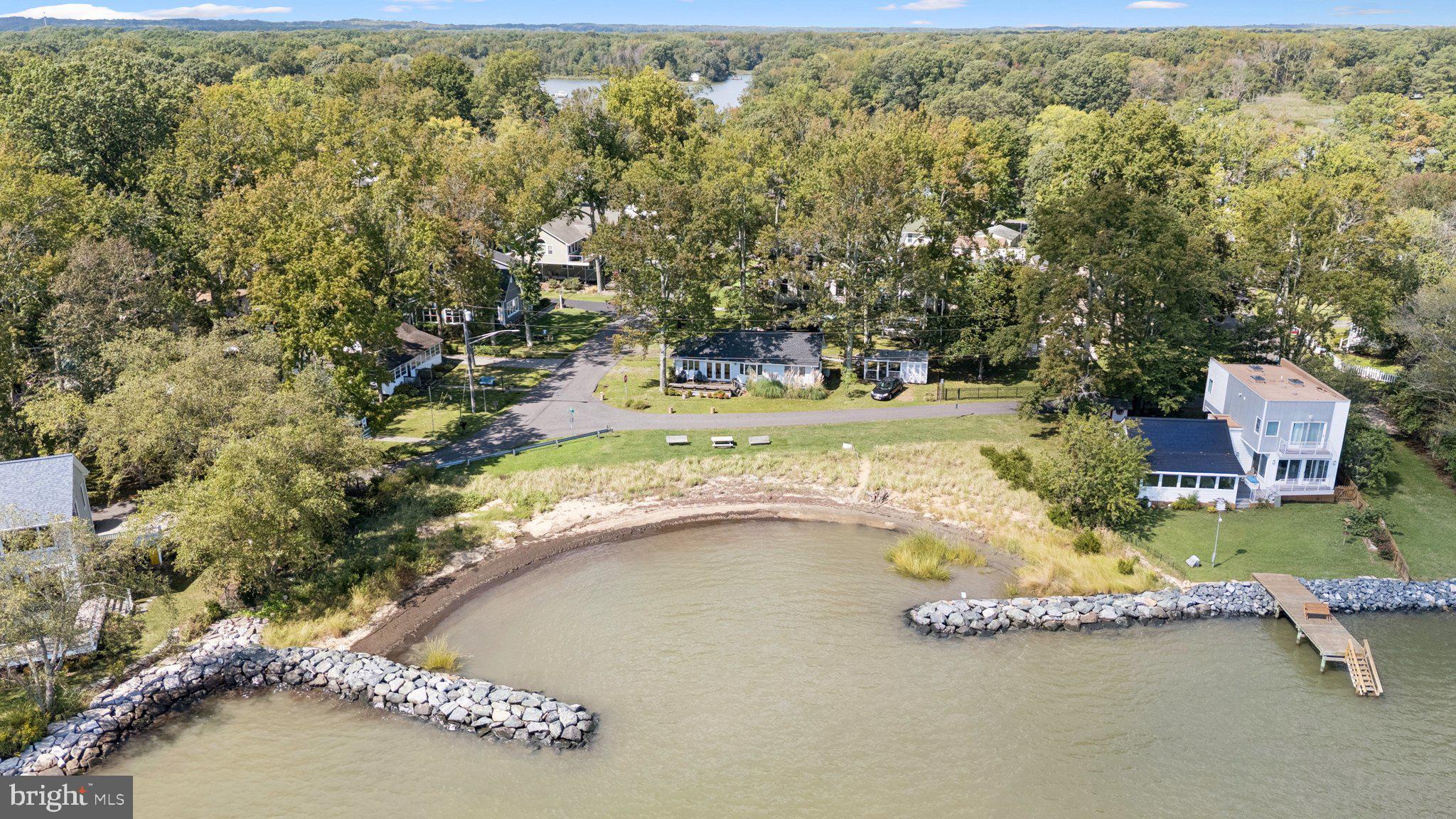 968 Chesapeake Avenue Deale, MD 20751 - Photo 52 of 57 an aerial view of residential house with outdoor space and trees around