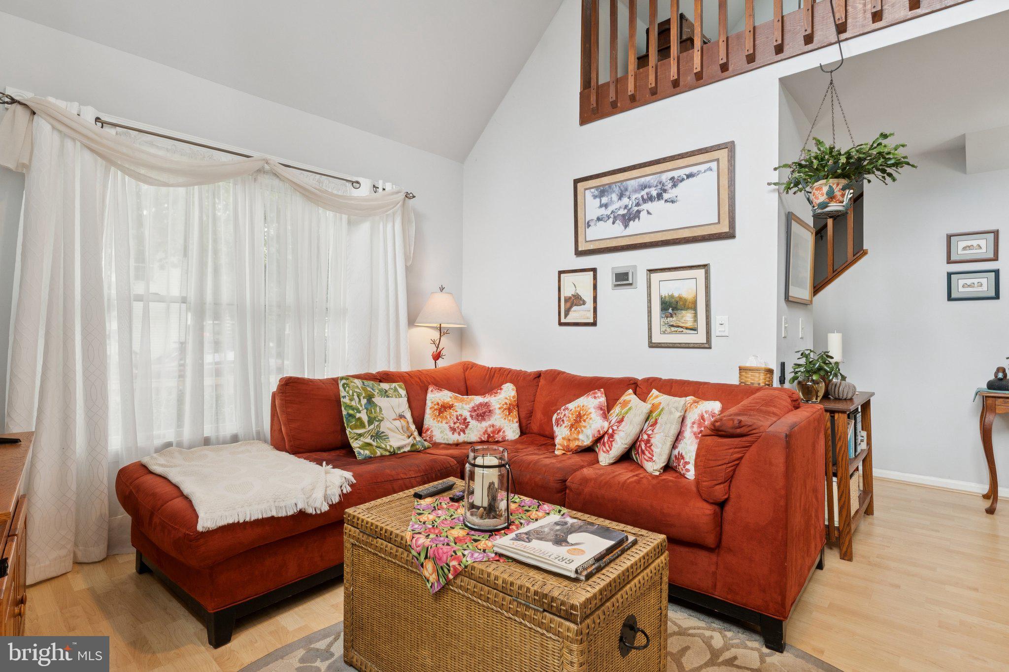 968 Chesapeake Avenue Deale, MD 20751 - Photo 7 of 57 a living room with furniture and a potted plant