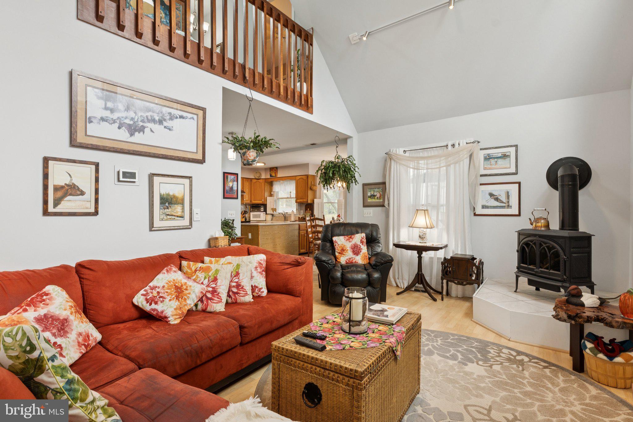 968 Chesapeake Avenue Deale, MD 20751 - Photo 8 of 57 a living room with furniture and wooden floor