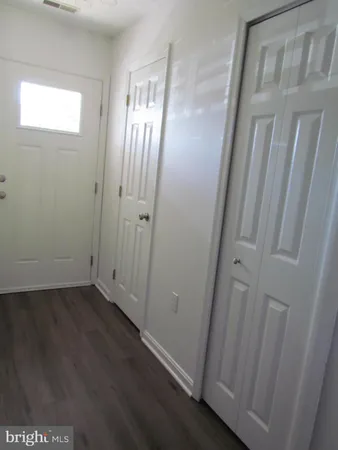 a bathroom with a sink and vanity