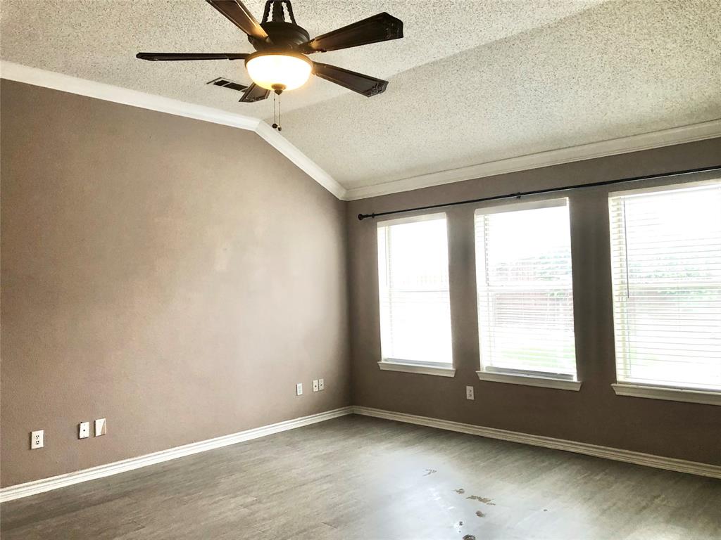 11409 Canoe Road Frisco, TX 75035 - Photo 2 of 19 a view of an empty room with a window
