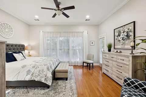 a bedroom with a bed and furniture