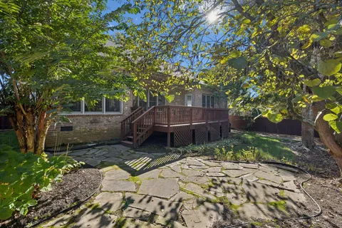 a backyard of a house with lots of green space