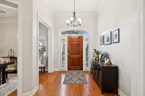 a very nice looking room with a chandelier