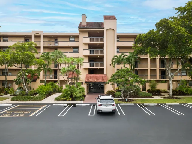 a front view of a house with a porch