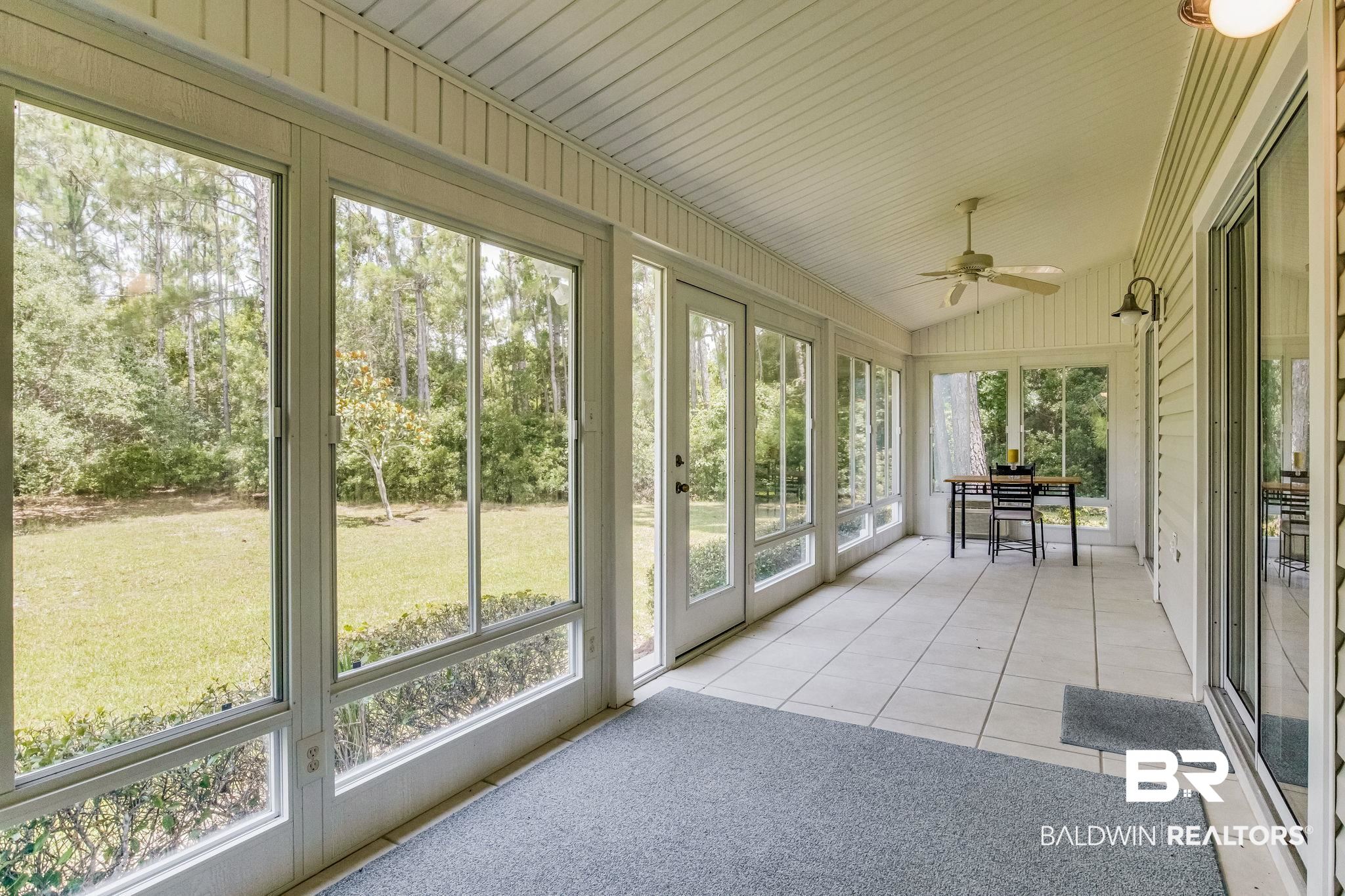 3200 Loop Road, Unit 66 Orange Beach, AL 36561 - Photo 18 of 28 glassed in porch- Can be air conditioned.