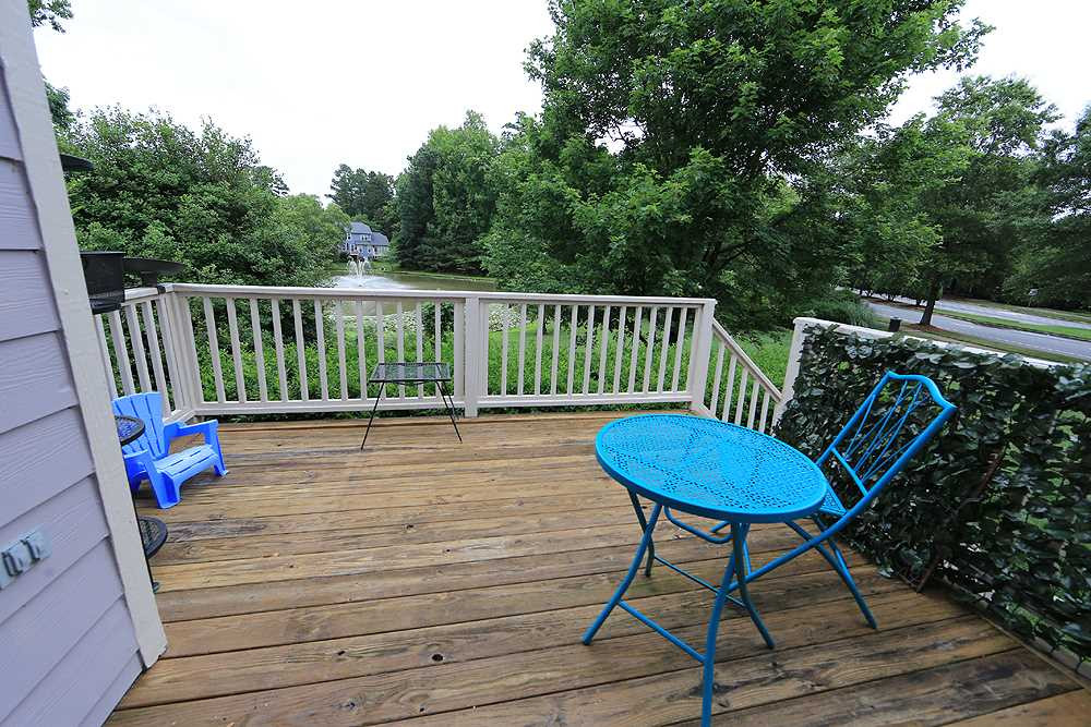 10400 Shadowlawn Drive Raleigh, NC 27614 - Photo 21 of 29 Enjoy your favorite beverage on the deck overlooking the pond. View of Pond from Deck