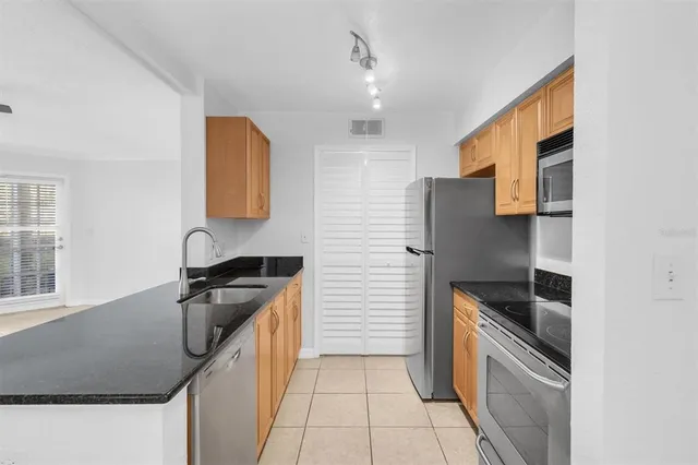 $179,900 | 3260 Haviland Court, Unit 102, Palm Harbor, FL 34684